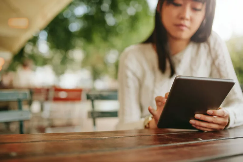 woman using tablet