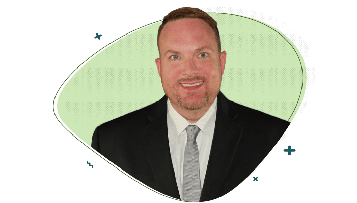 smiling picture of multifamily executive on green background | AI Leasing Assistant