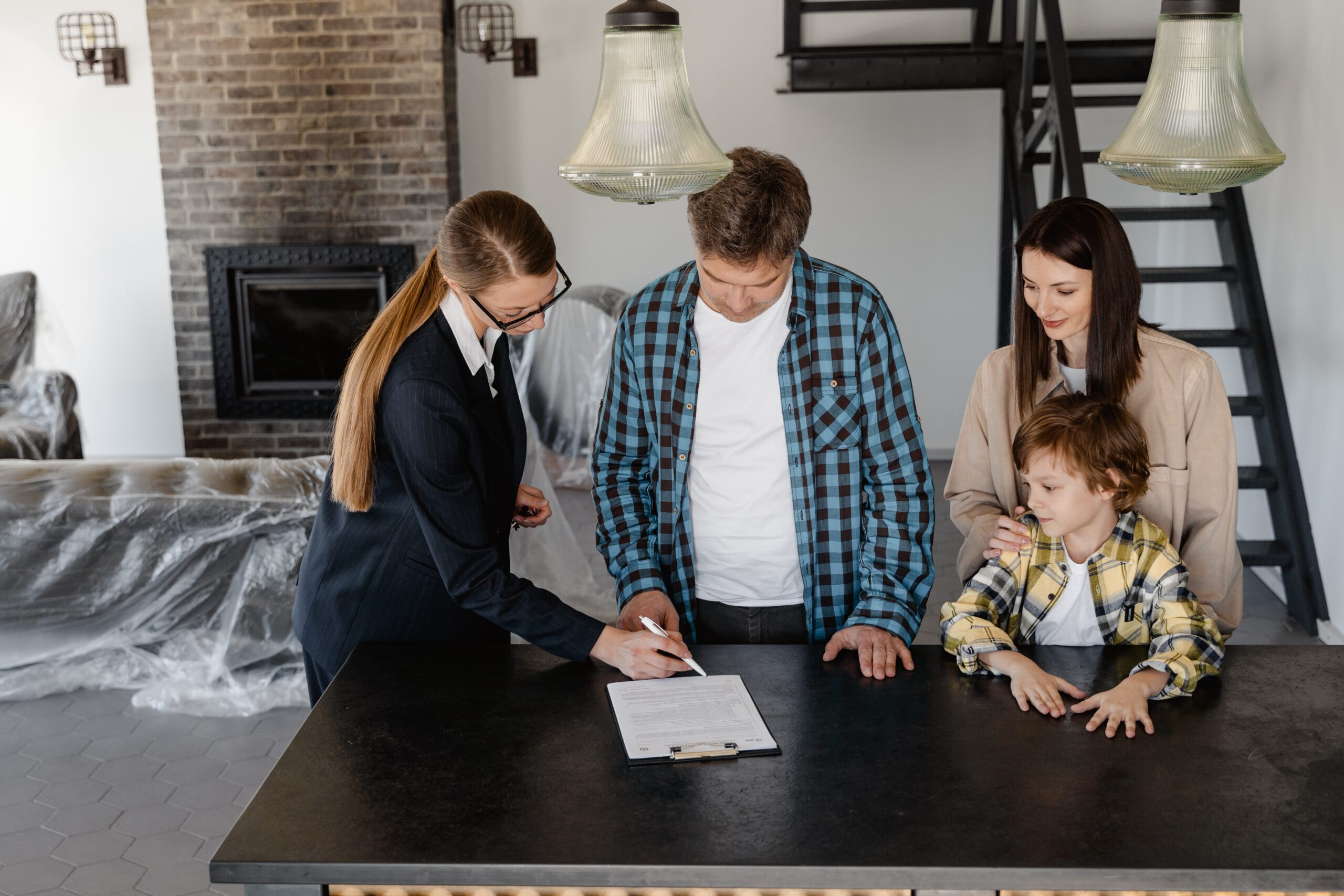 Family signing a Lease