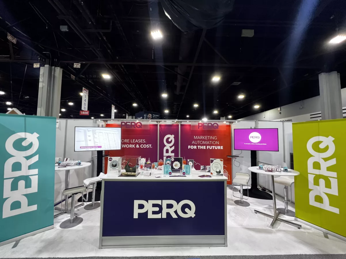 a picture of the PERQ booth at one of many multifamily conferences they attend