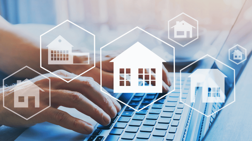 a pair of hands typing on a laptop, overlayed with house icons