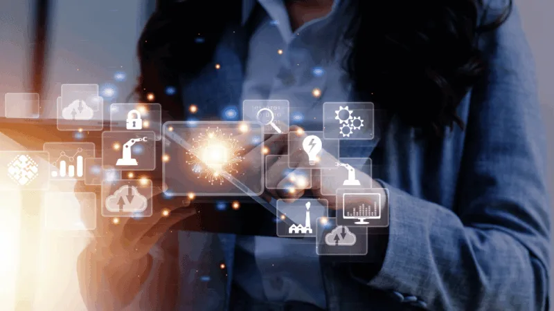a woman holding a tablet with glowing digital icons floating above it
