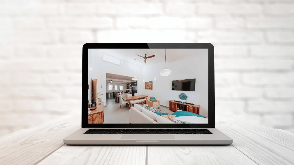 a laptop showing an apartment video tour from a modern multifamily leasing website